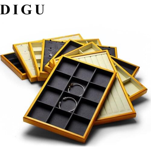 Wooden jewelry look at pallets, ring storage trays, necklaces, pendants, brooches, display boxes, empty trays