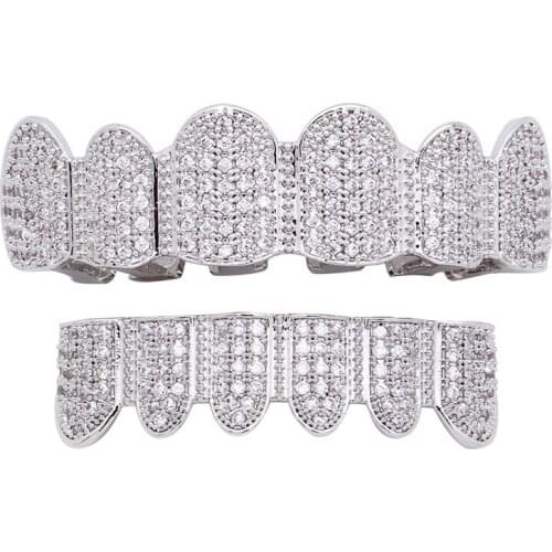 Lucky Sonny Silver Color Teeth Grillz Top & Bottom Iced CZ Out Dental Grills Fake Teeth Caps Hip Hop Body Jewelry Free Shipping