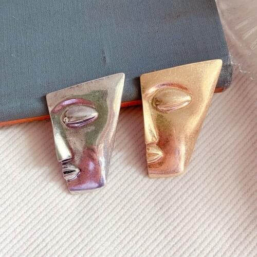 HUANZHI 2020 New Metal Retro Matte Abstract Irregular Alien Human Face Brooch for Women And Man Coat Accessories Party Jewelry