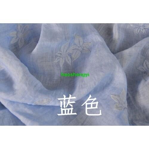 High-end ramie embroidered orange red linen garment fabric