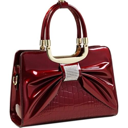 CHICTURESQUE Women's Red Clutches