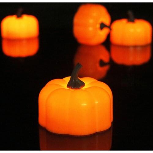 Flickering Pumpkin Tea Lights 12 Pack Flickering LED Pumpkin Lights with Battery Flameless Pumpkin Candles Light for Halloween