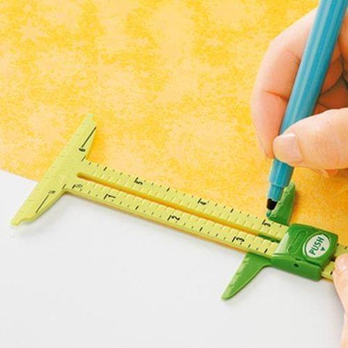 5-IN-1 SLIDING GAUGE No-Hassle Triangles Gauge (ST-A24) 5-IN-1 SLIDING GAUGE WITH NANCY ZIEMAN Measuring Sewing Tool