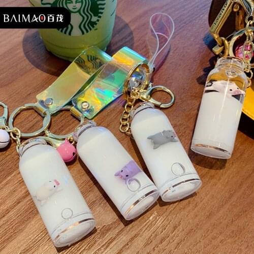 2021 New Trend Floating Milk Pig Key Chain Pendant Quicksand Drifting Bottle Into Oil Pig Pig Bag Pendant Wholesale Purses