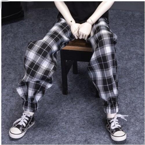 The BJD Doll Suit fits with a 1/3 1/4 Uncle size with stylish go-around plaid pants in black and white casual pants