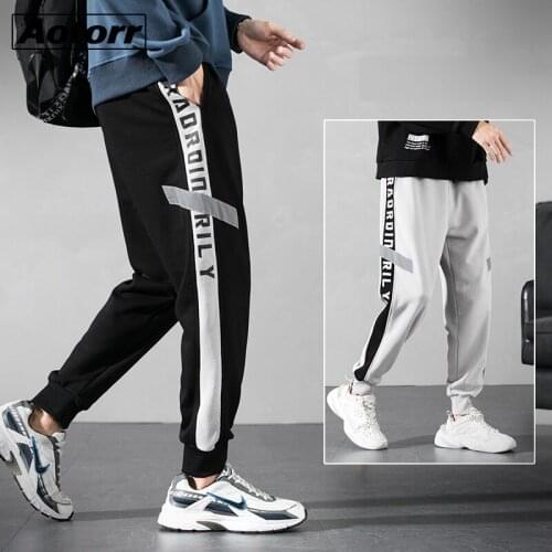 Mens Joggers Casual Pants Loose Men Sportswear Tracksuit Bottoms Fashion Sweatpants Trousers Gyms Jogger Track Pants 4XL
