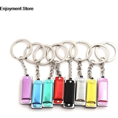 1 * Keychain Harmonic Harmonica Mini 8 Tone 4 Holes Harmonica Keychain Key 3.6 * 1.2 * 0.8cm