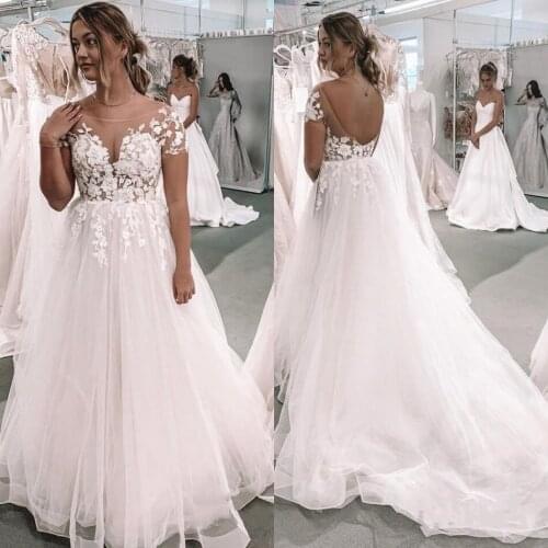 Plus Size Wedding Dresses 2020 Boat Neck Backless A Line Appliques Illusion Bodice Garden Country Bridal Gowns robes de mariee