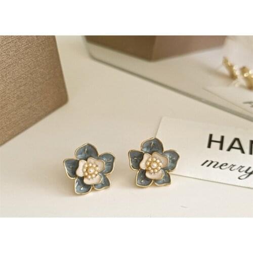 CHYVENEE Stud Earrings