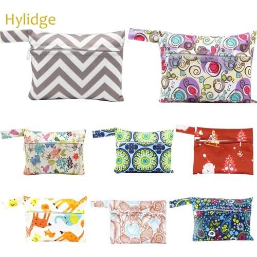 Hylidge 14x18cm Mini Wet Bag for Stroller Organizer Bag Mommy Waterproof Diaper Bag Cute Flower Cartoon Wetbag for Diapers Bags