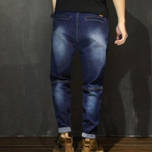 Fashion Mens Loose Fit Harem Pants Plus Size 7XL Elastic Waist Jeans Casual Streetwear Hip Hop Long Joggers Pants Denim Pants