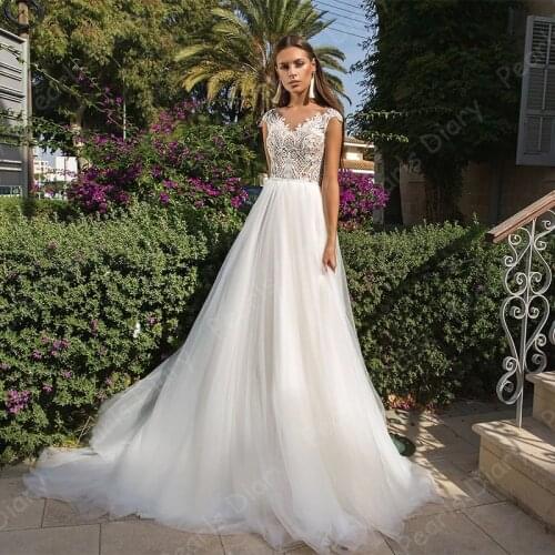 Elegant Beach Wedding Dress 2021 Vestido De Noiva Sheer O-neck Cap Sleeve Applique Boho Tulle Bridal Gowns Sweep Train For Bride