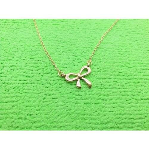 Cute and compact Bow Necklace for Womens Wedding Lucky Blessing hollow bow-knot small rosette pendant Necklace Jewelry