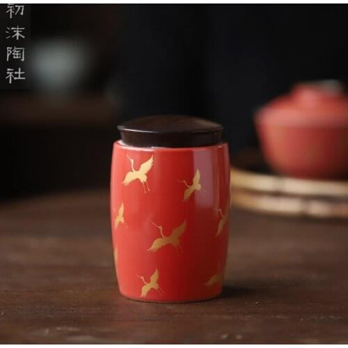 Chu Mo Tao she Jingdezhen ebony wood covered coral red crane tea pot tea pot ceramic portable sealed pot