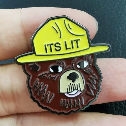 Its Lit Smokey The Bear Enamel Pin Smokey Bears world is on fire. But the old mascot stays relevant
