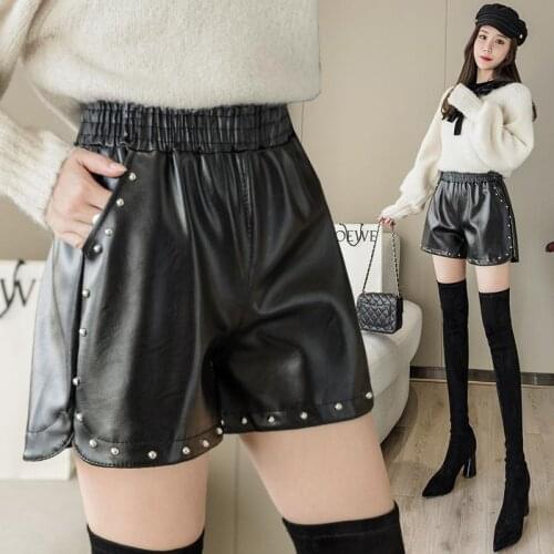 Womens leather shorts autumn and winter 2021 new high waist fashion wide leg rivet bead loose thin versatile PU leather pants