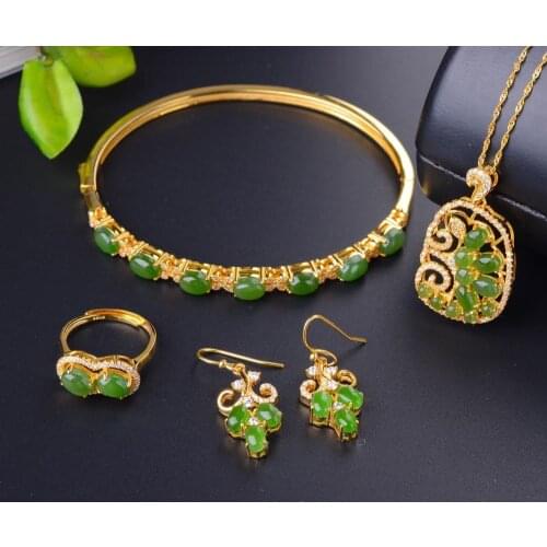Natural Hetian jade jewelery pendant bracelet earrings four sets 925 silver inlaid gold live mouth