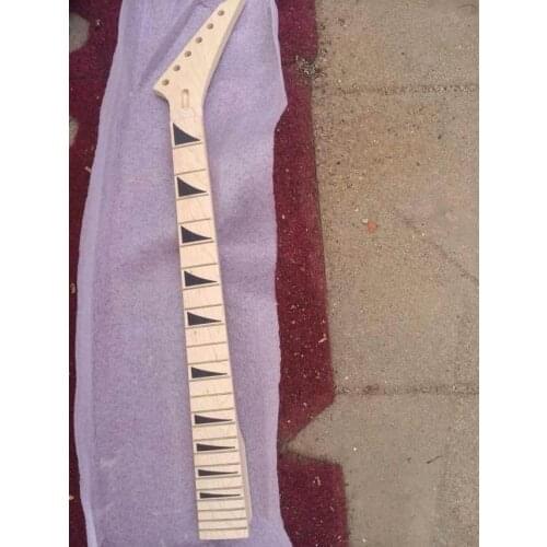 One piece of unfinished electric guitar neck
