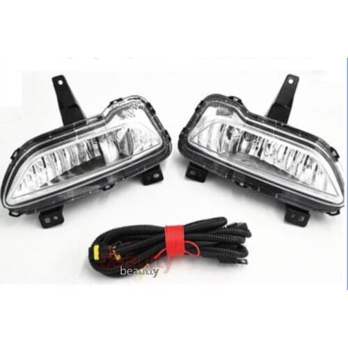 A pair of modified fog lamps + wiring harness for great wall pora/pao