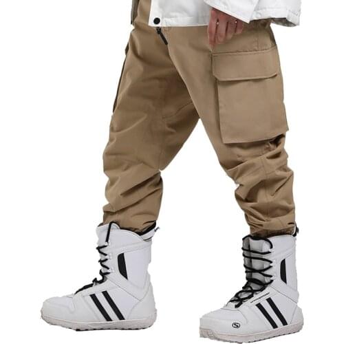 Fashion Tie Feet Wearab Women and Men Ice and Snow Pants Outdoor Snowboarding Clothing Trousers Skiing Suit Wear 15K Waterproof