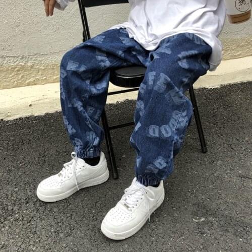 Spring letter graffiti jeans mens and womens loose fit street fashion brand wide leg pants hip hop legged pants