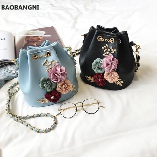 New Womens Bag Korean Fashion Solid Color Bucket Bag Flower Small Fresh Shoulder Slung Clip Small Bag