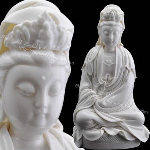 11 inches with Avalokiteshvara sitting (after He Zhaozong) antique style imitation Dehua white porcelain ceramic ornaments