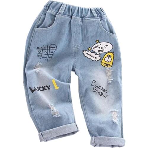 Childrens jeans 2021 spring and autumn new Korean cartoon jeans boys and girls casual fashion baby ripped trousers
