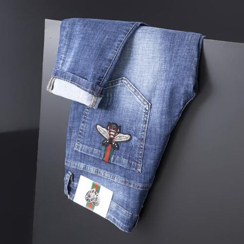 In the fall and winter of 2021 men jeans stretch foot trousers cultivate ones morality handsome embroidery pattern