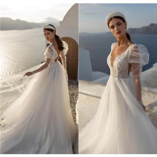 Elegant Beach Wedding Dresses Lace Applique A Line Deep V Neck Boho Wedding Dress Plus Size Backless Long Sleeve Robes De Mariée