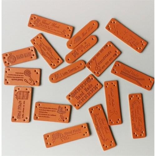 New 100 Pcs/Set 17 Design Handmade Patchwork Labels PU Tags DIY Sewing label cloth Garment Labels For Sewing Accessories