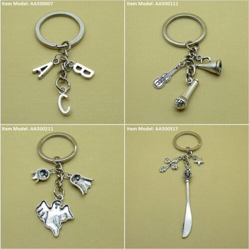 Keychain Keyring C B A Letter Alphabet Microphone Violin Speaker Trumpet Loudspeaker Horn Ghost ET UFO Alien Knife Table Crown