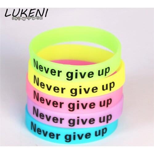 LUKENI 100pcs Never Give Up Luminous Silicone Wristbands Motivational Hologram Sport Bracelets &Bangles Gifts Wholesale SH095