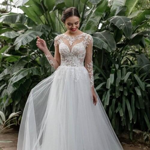 Luxury Long Sleeves Wedding Dress O Neck Illusion Elegant Lace Appliques Sexy Beading White Tulle Bridal Gown for Women