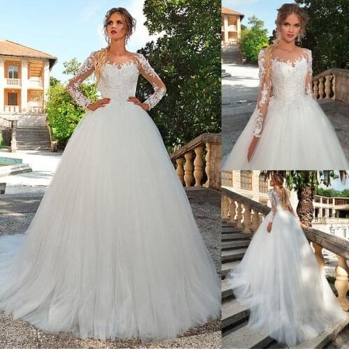 Wonderful Tulle Bateau Neckline Ball Gown Wedding Dress With Lace Appliques Long Sleeves Bridal Dresses abito da sposa