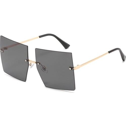 2021 new hot seller-shaped frameless metal sunglasses women seasonally hot style simple fashion elegant sunglasses