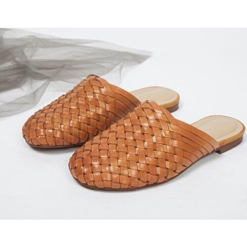 Shoes female 2019 summer new wave leather hand-woven vintage baotou word flat flat bottom outdoor sandals and slippers