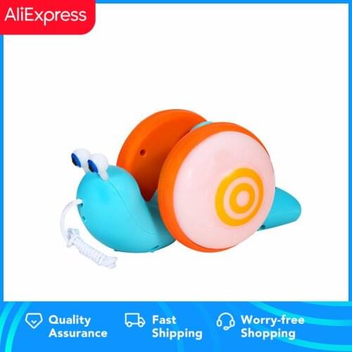 Baby Toys Musical Crawl Snail Toy with Stacker - Promotes Babys Crawling and Walking. Rolls and Spins Its Shell As It Moves