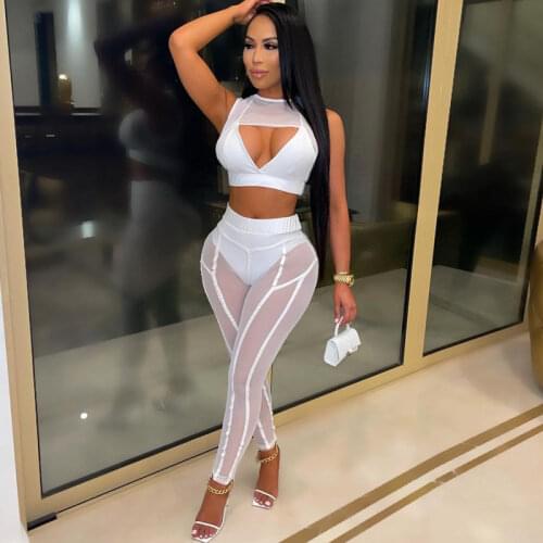 2021 Best Quality Fashion Design 2 pcs Mesh Women Set Solid Hollow Out Short Tops Long Pants Summer Sexy Club Outfits