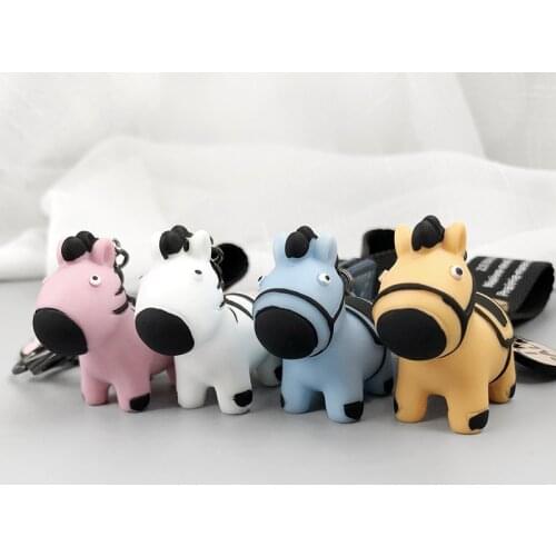 New Korean version of the new creative silicone doll leather rope key chain bag cross package decorative pendant car key ring