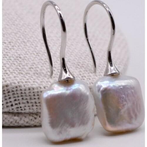 Large square earrings. Natural square freshwater pearls. Earrings in sterling silver. Fishhook shape. Womens pearl earrings
