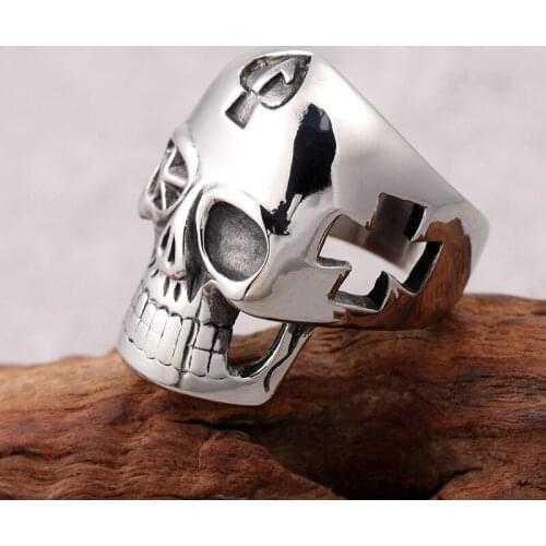 Europe and the United States retro mens cross skull ring titanium steel hollow ring creative ghost head jewelry