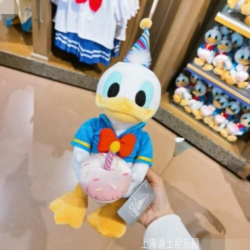 New style Shanghai Disney Donald Duck holding cake cartoon cute plush doll decoration childrens gift AG2557