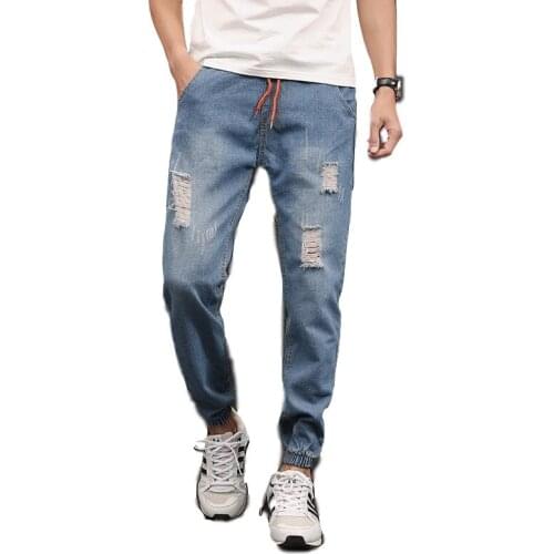 5XL plus size men jeans spring autumn men beam feet pencil pants hole jeans fashion drawstring ankle-length pants denim pants