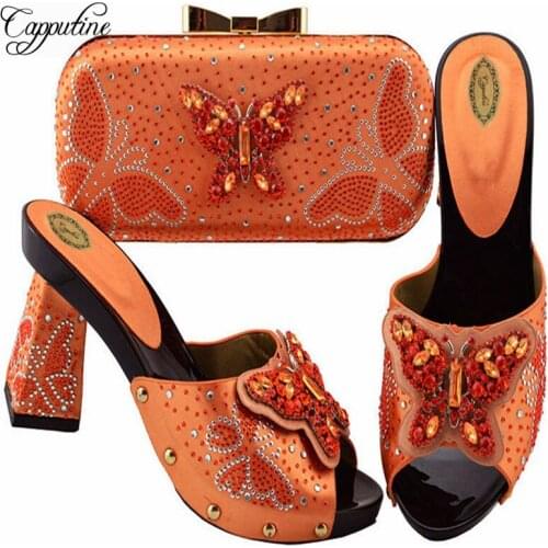 Yuternity Women's Orange Bags