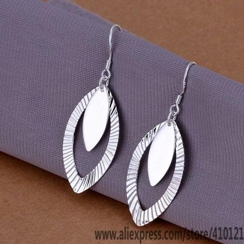 E239 Hot Sale High Quality Silver Clolor Jewelry,Wholesale Jewelry Elegant Charms Fashion Hollow Egg Shape Flower Earrings