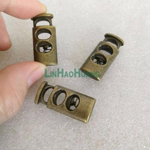 Wholesale Free shipping 50pcs 28*13mm Big Oval metal alloy stoppers toggle cord locks Drawstring lock with 7mm holes STP-011