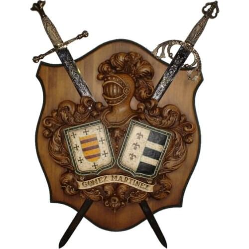 Wood carvings Heraldry 2 Shields surnames hand painted over metope Wood with two swords toledo atravesadas