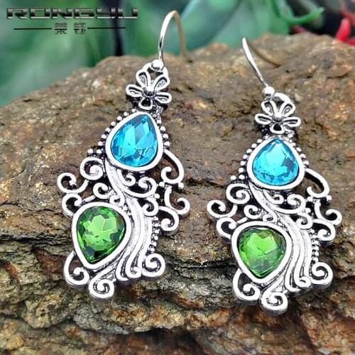 Rongyu creative flower peacock open screen Earrings European and American retro Sea Blue Topaz Earrings