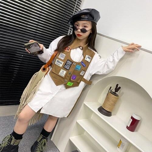 Girls design sense fake two-piece shirt 2021 autumn new girl stitching label vest top